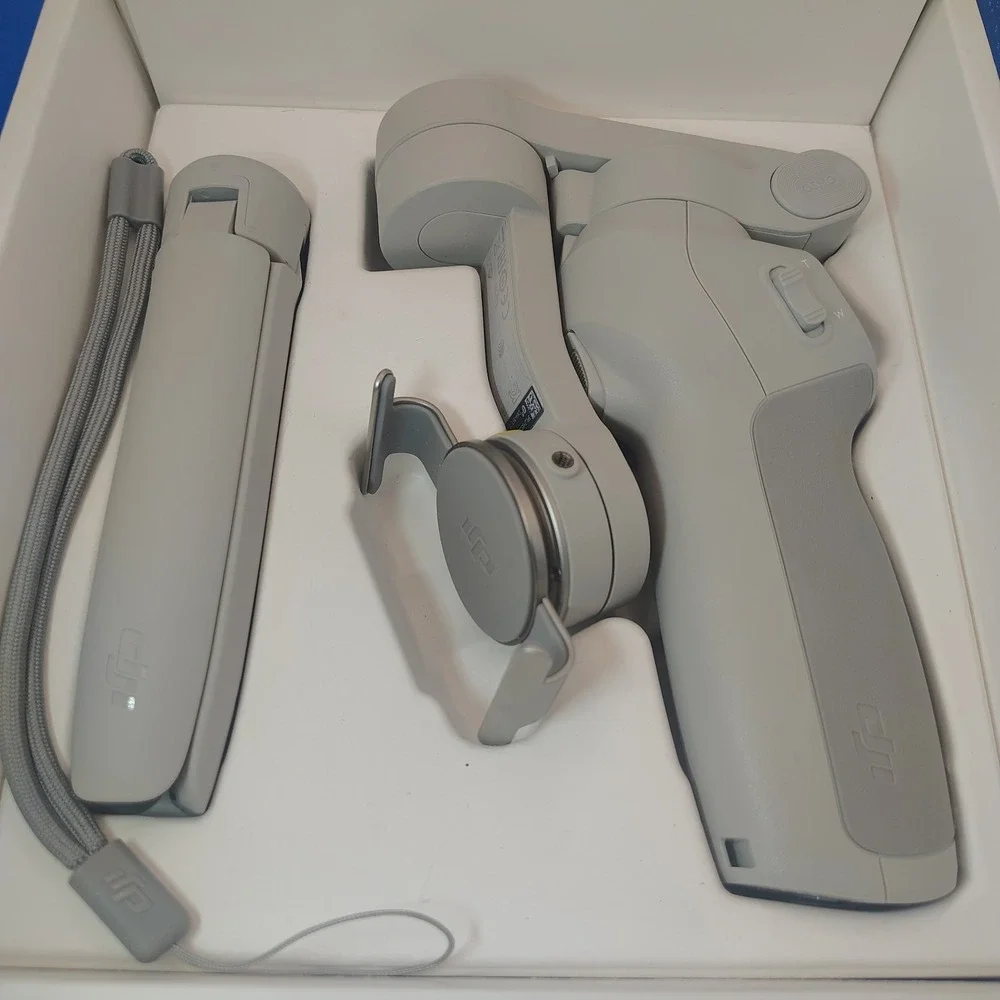 DJI OM 4 SmartPhone Gimble 3 Axis Stabilizer New Open Box Fully Tested
